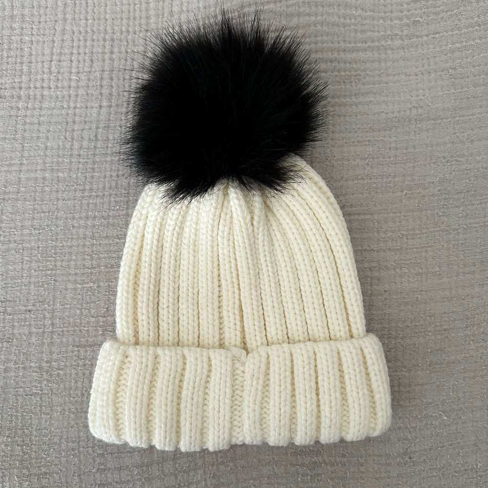 White and black Pom Pom beanie